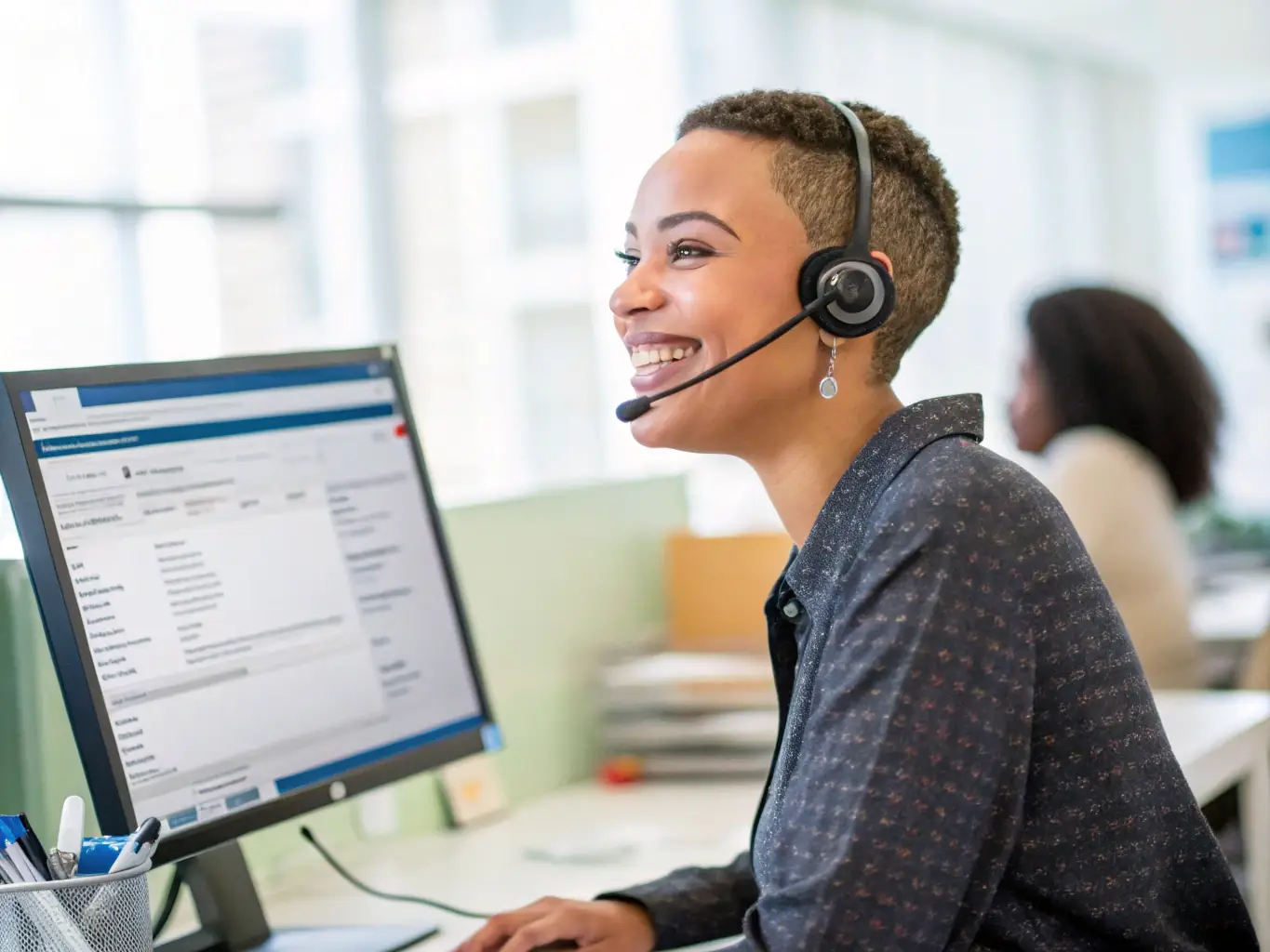 A friendly and helpful Cactus Tours Madagascar support team member assisting a travel agent over a video call, resolving a query and ensuring a smooth booking process.