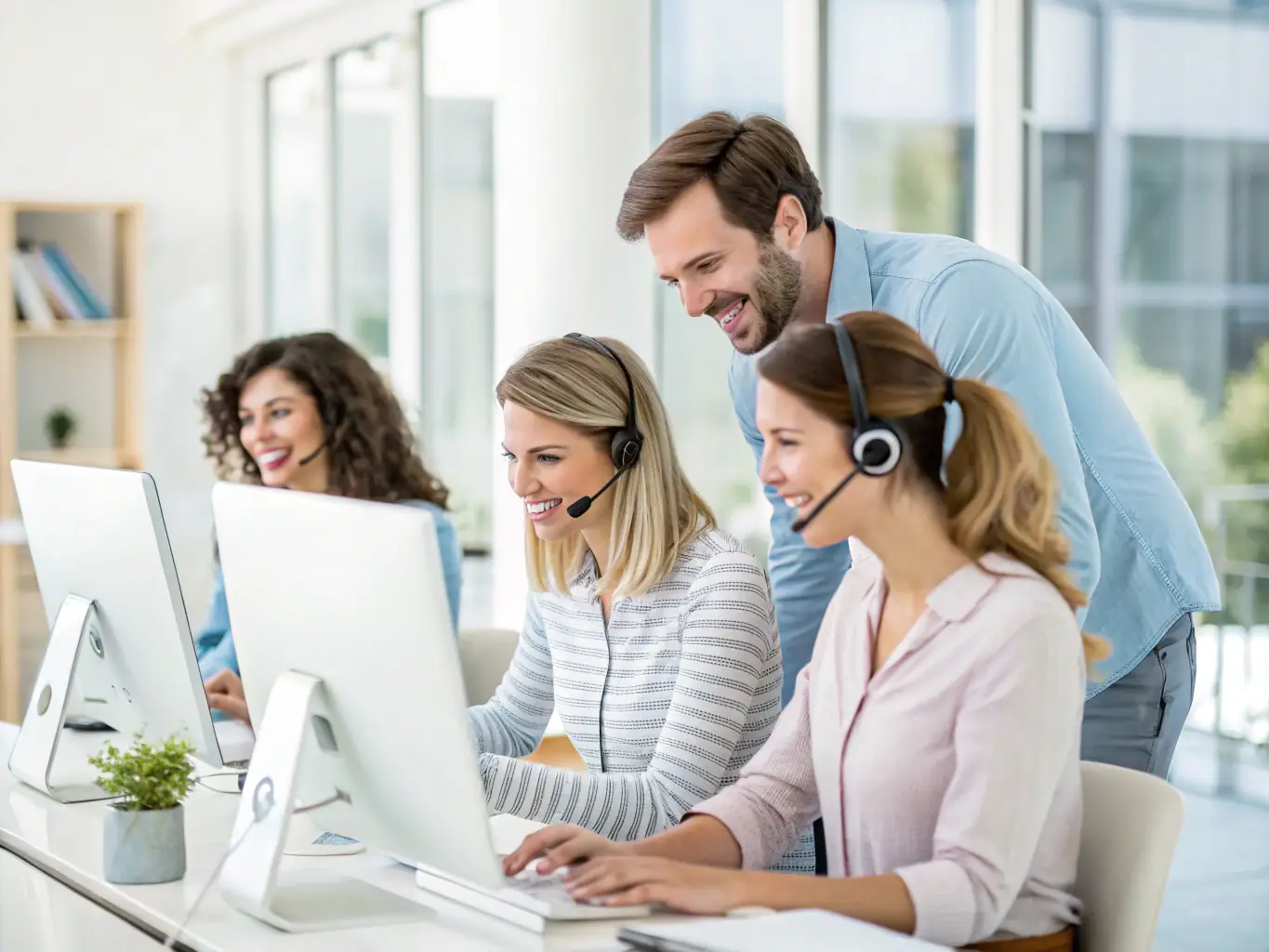 A professional photograph of the Cactus Tours Madagascar support team assisting a travel agent via video conference, highlighting their commitment to providing personalized and efficient service.